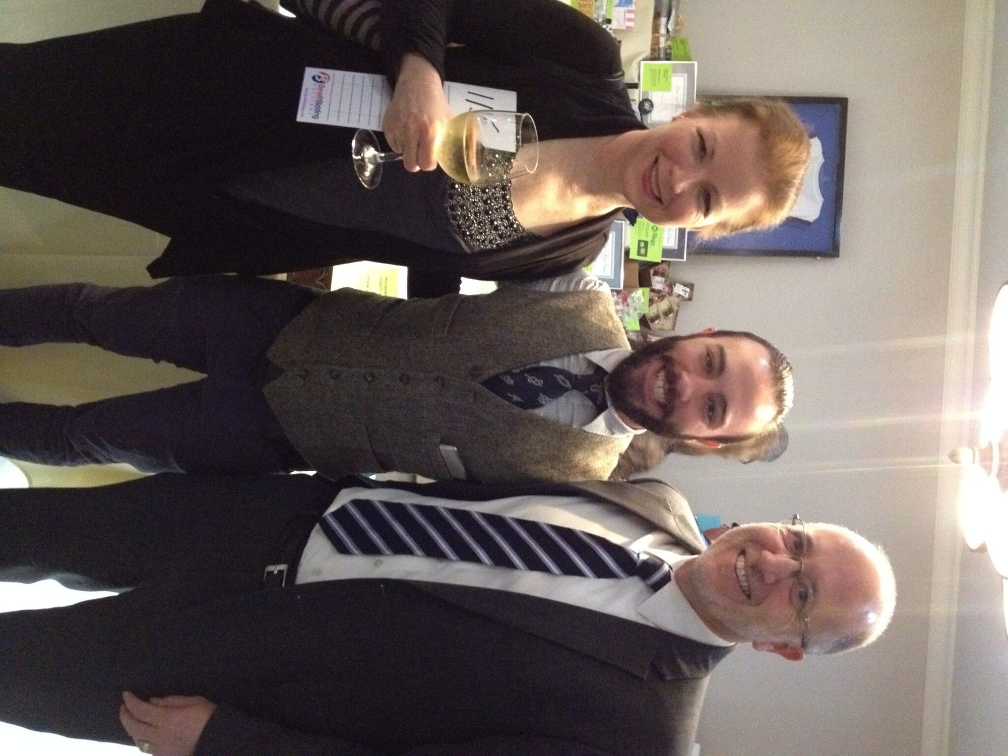 Alex Beard, Hugs Cafe's legal advisor and his wife,  Susan Beard with Food Network's Chef Trevor Ball